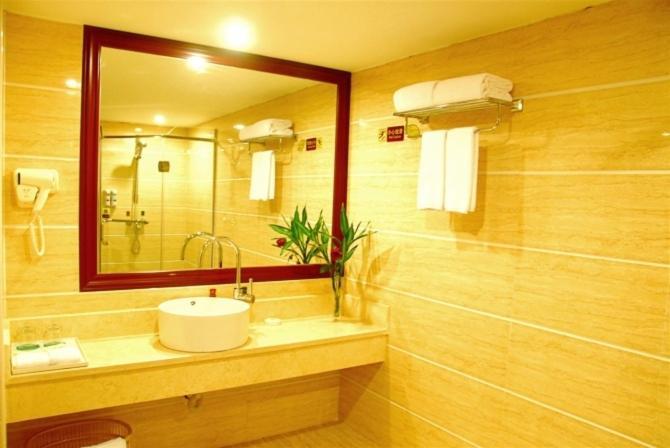 Vienna Hotel Chaoyang Наньнин Номер фото