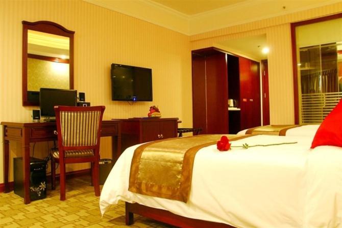 Vienna Hotel Chaoyang Наньнин Номер фото