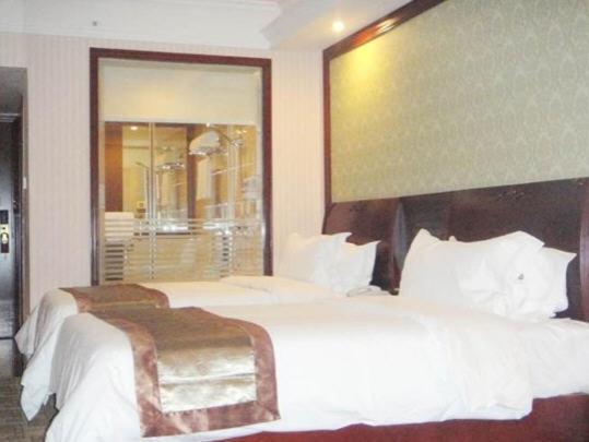 Vienna Hotel Chaoyang Наньнин Номер фото