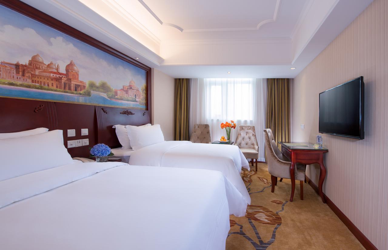 Vienna Hotel Chaoyang Наньнин Экстерьер фото