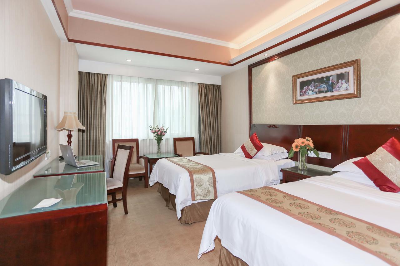Vienna Hotel Chaoyang Наньнин Экстерьер фото